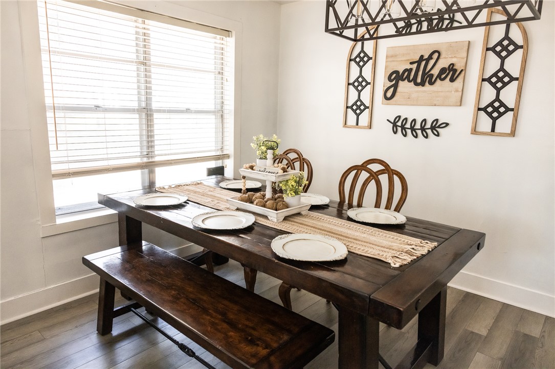 1308 Antone Street Bryan, TX 77803 - Photo 4 of 36 a view of a dining room with furniture window and wooden floor