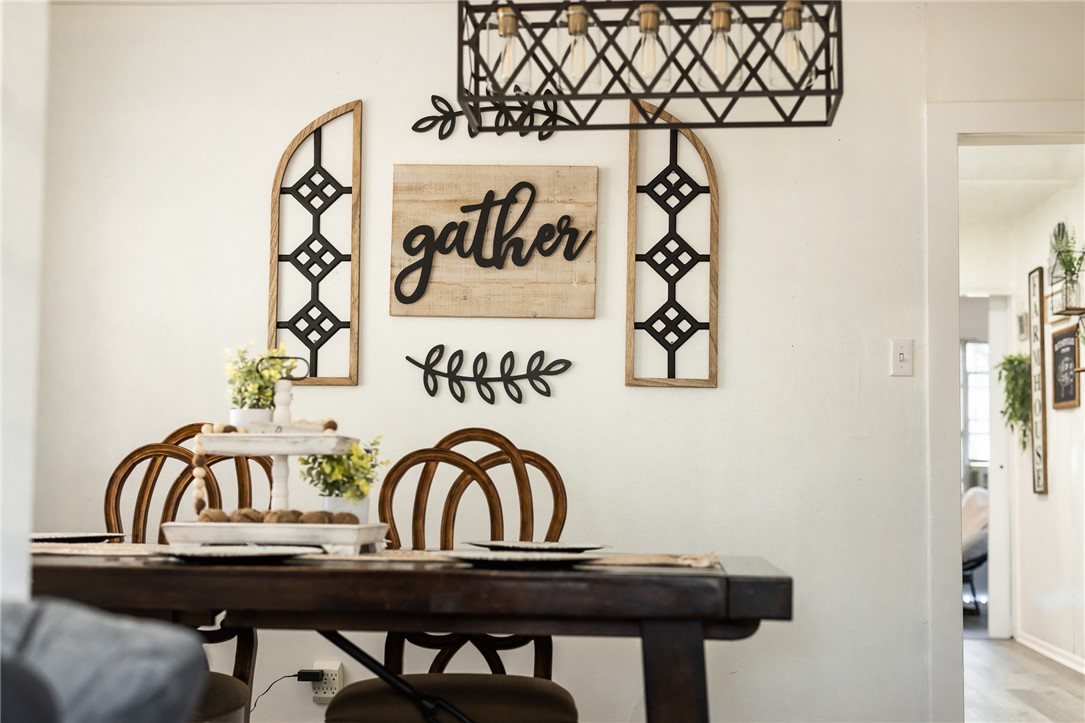 1308 Antone Street Bryan, TX 77803 - Photo 6 of 36 a view of a that has a table and chairs