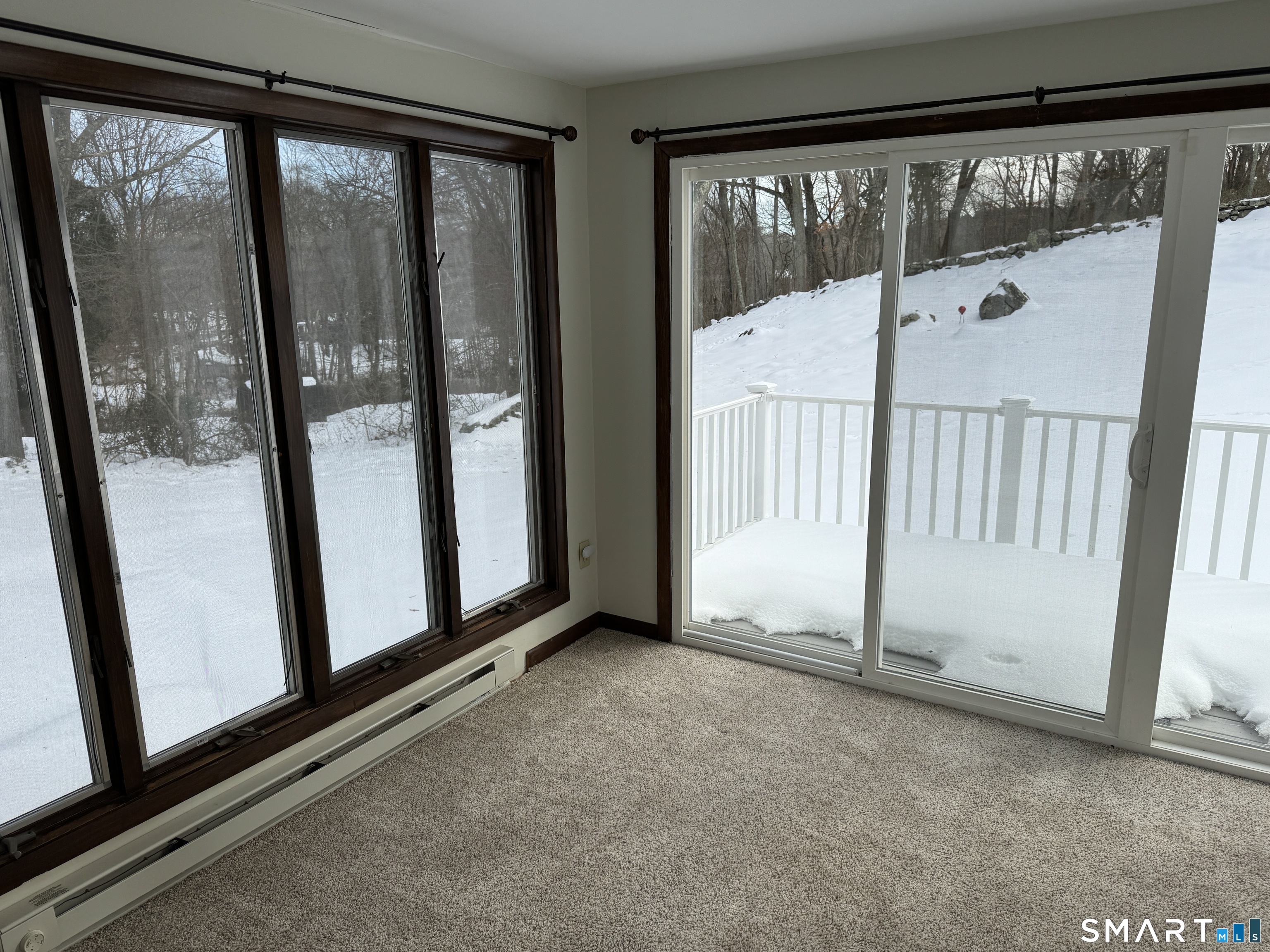 10 Milton Road Quaker Hill, CT 06375 - Photo 15 of 30 Heated 4 season sunroom with panoramic views of the lovely back yard