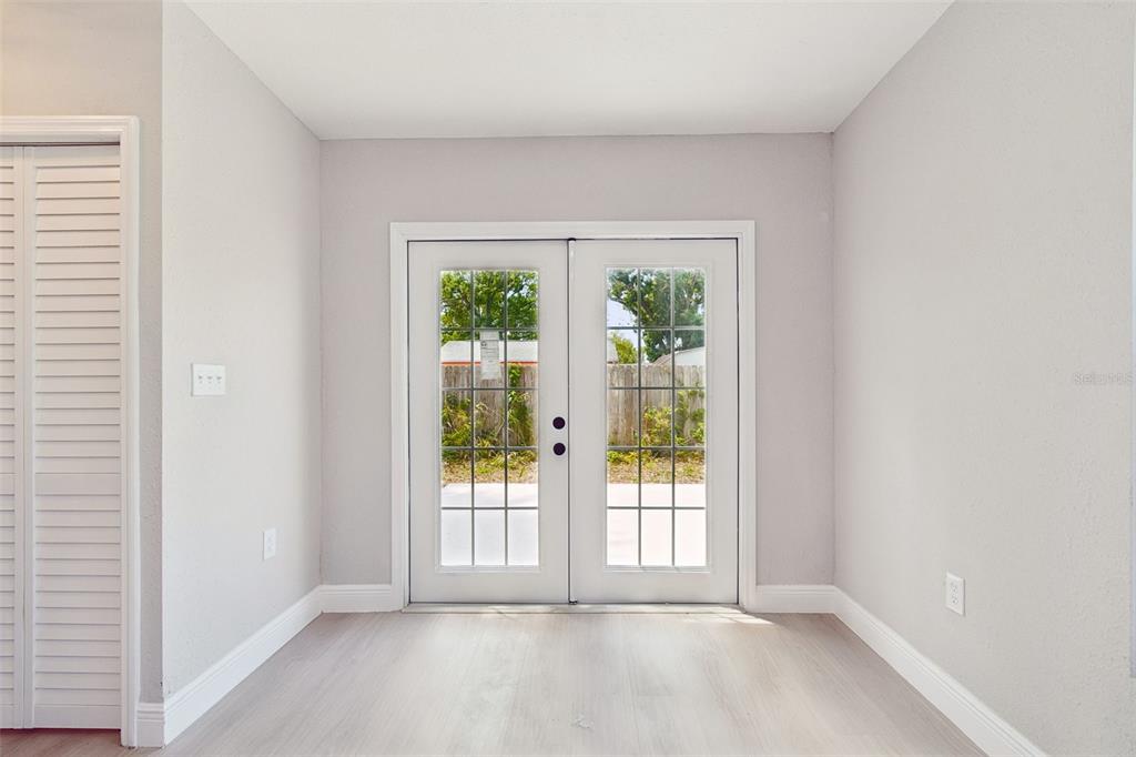 3912 West Pine Street Tampa, FL 33607 - Photo 21 of 60 a view of an empty room with a window