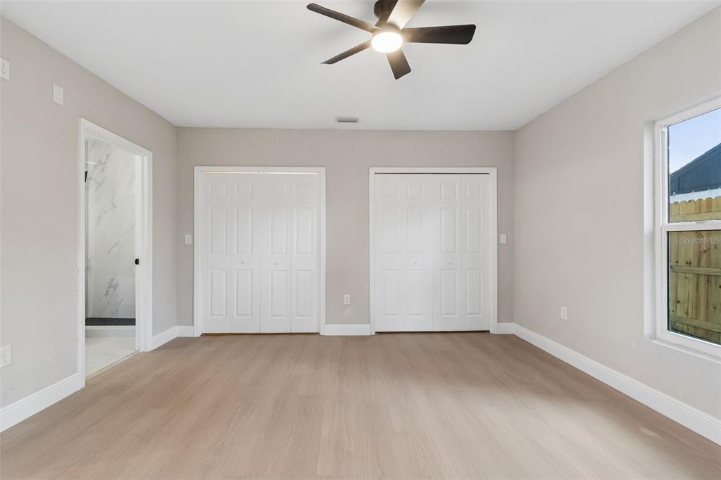 3912 West Pine Street Tampa, FL 33607 - Photo 25 of 60 a view of an empty room with a window