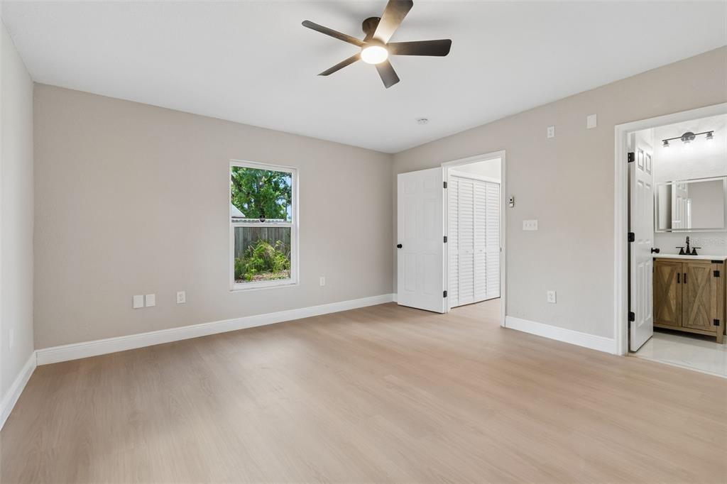 3912 West Pine Street Tampa, FL 33607 - Photo 27 of 60 wooden floor in an empty room with a window