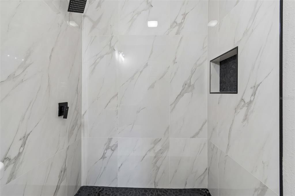 3912 West Pine Street Tampa, FL 33607 - Photo 29 of 60 a bathroom with a shower