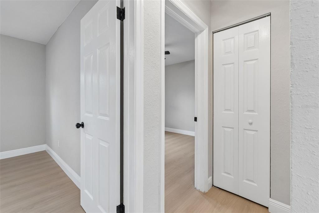 3912 West Pine Street Tampa, FL 33607 - Photo 30 of 60 a view of a hallway with wooden floor