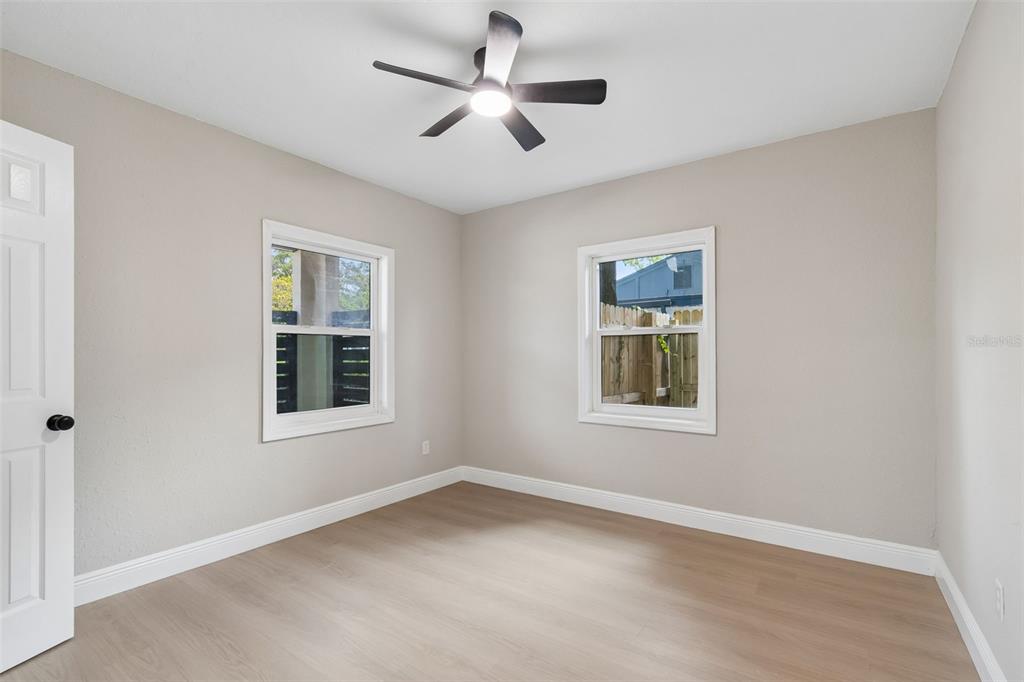 3912 West Pine Street Tampa, FL 33607 - Photo 31 of 60 a view of an empty room with a window