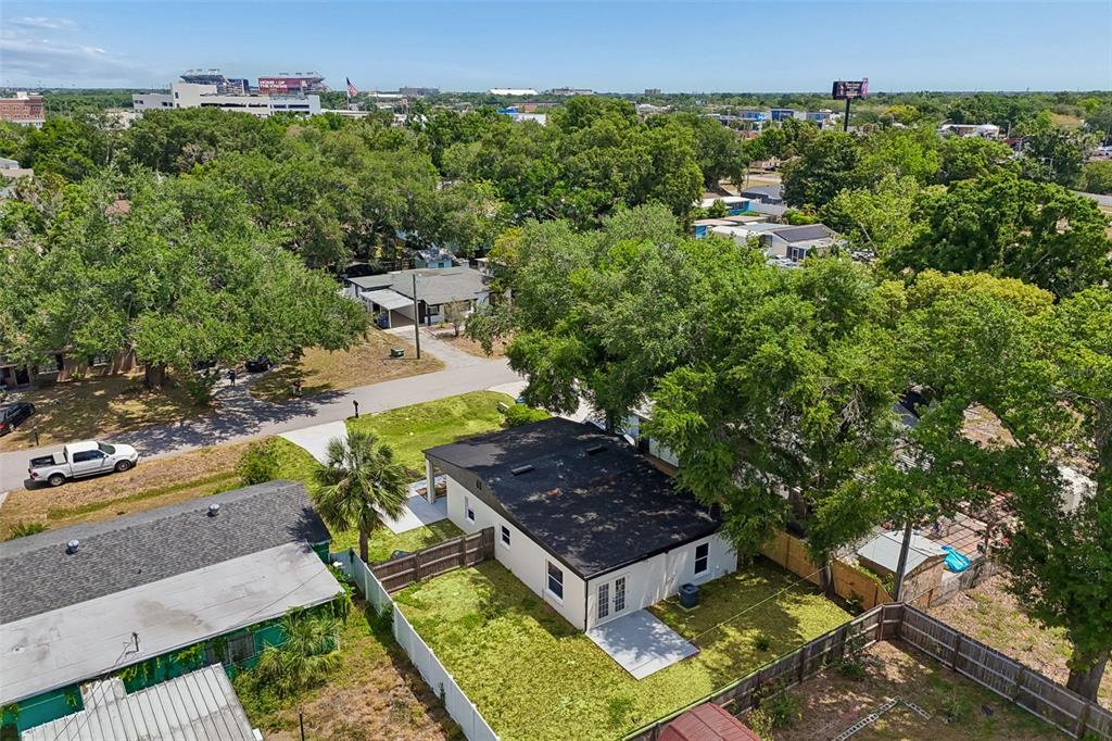 3912 West Pine Street Tampa, FL 33607 - Photo 51 of 60 an aerial view of a house with yard swimming pool and outdoor seating