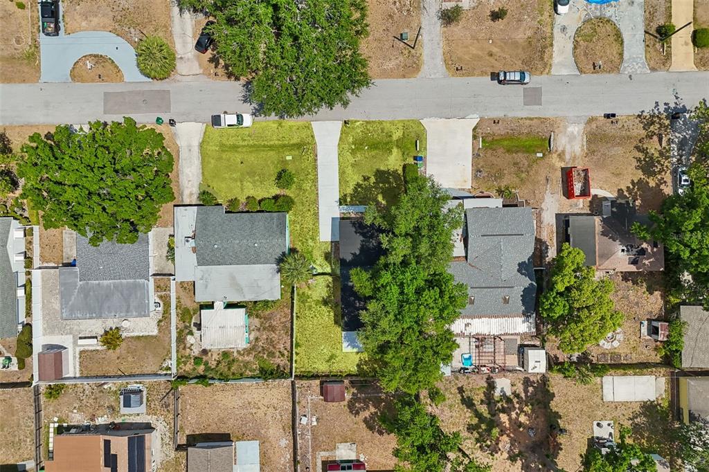 3912 West Pine Street Tampa, FL 33607 - Photo 56 of 60 an aerial view of multiple houses with a yard