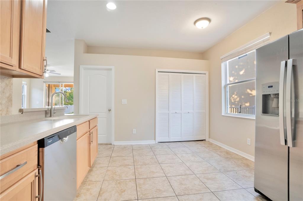 15031 Skip Jack Loop Lakewood Ranch, FL 34202 - Photo 11 of 27 a view of a kitchen with a sink