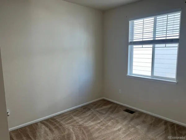 a view of a room with a window
