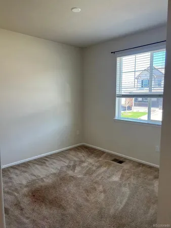 an empty room with a window