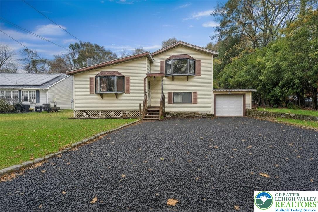217 Coach Road Tobyhanna, PA 18466 - Photo 1 of 35 a view of a house with a yard