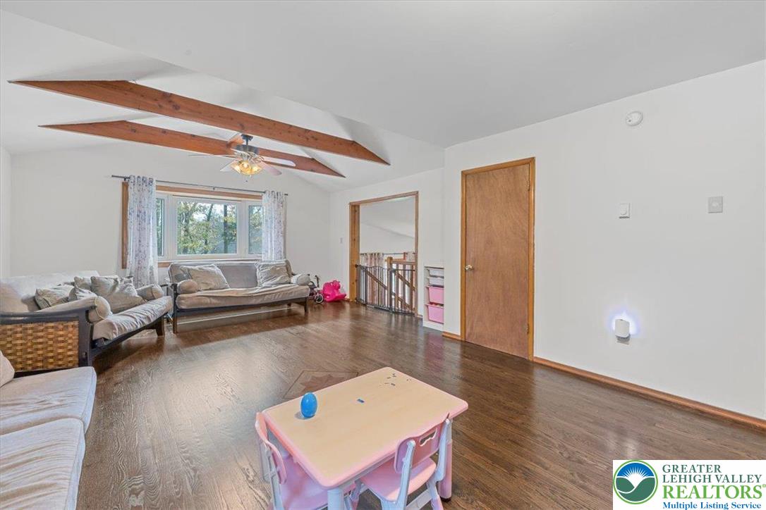 217 Coach Road Tobyhanna, PA 18466 - Photo 20 of 35 a living room with furniture and a wooden floor