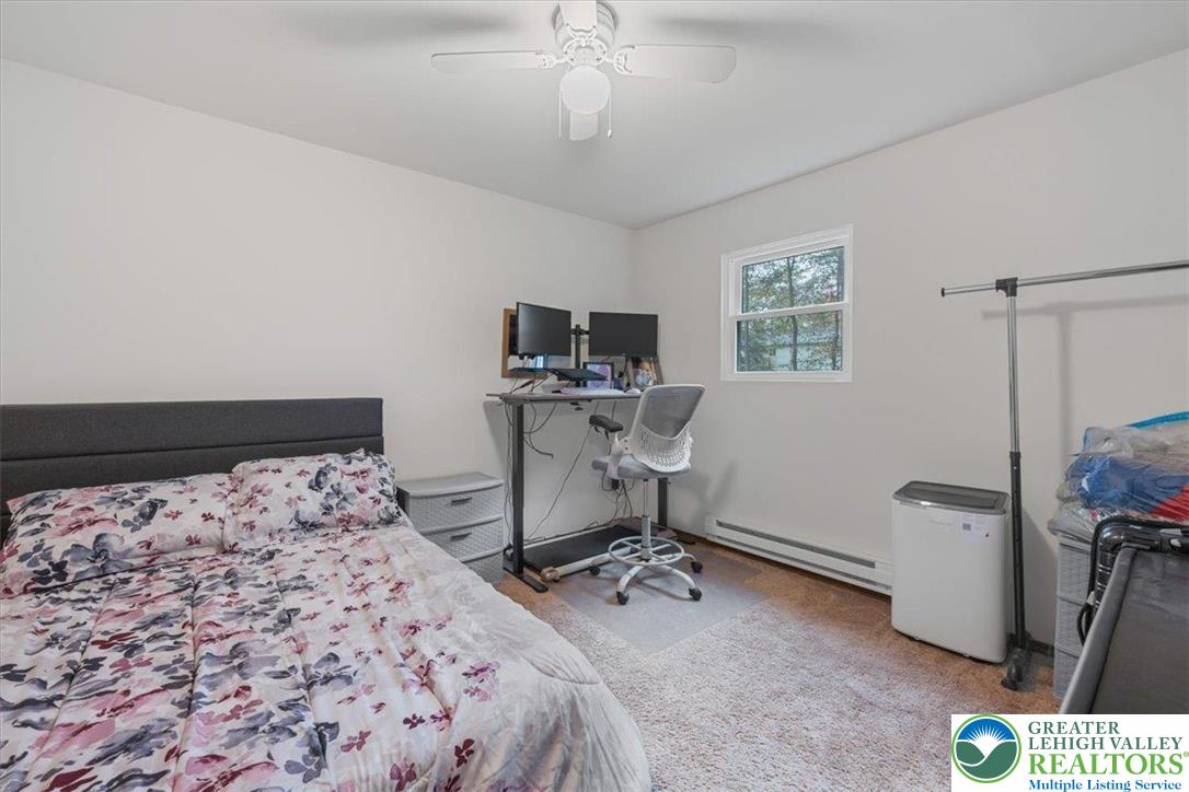 217 Coach Road Tobyhanna, PA 18466 - Photo 23 of 35 a bedroom with bed and a window