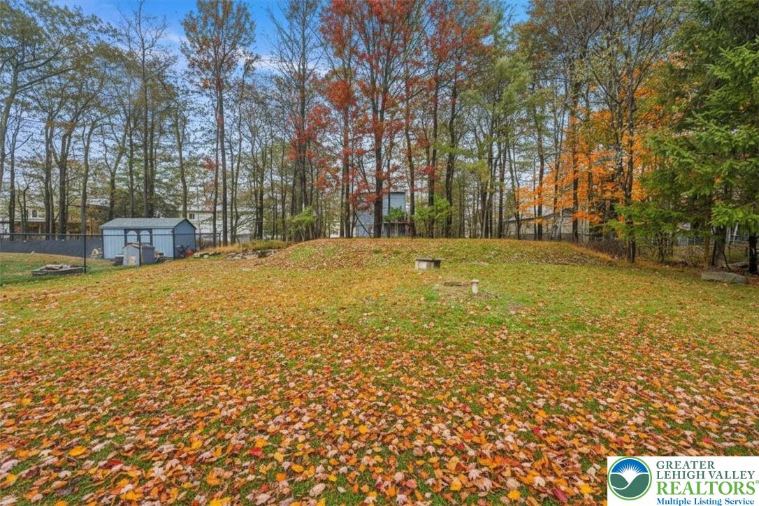 217 Coach Road Tobyhanna, PA 18466 - Photo 32 of 35 a view of a yard with an outdoor space