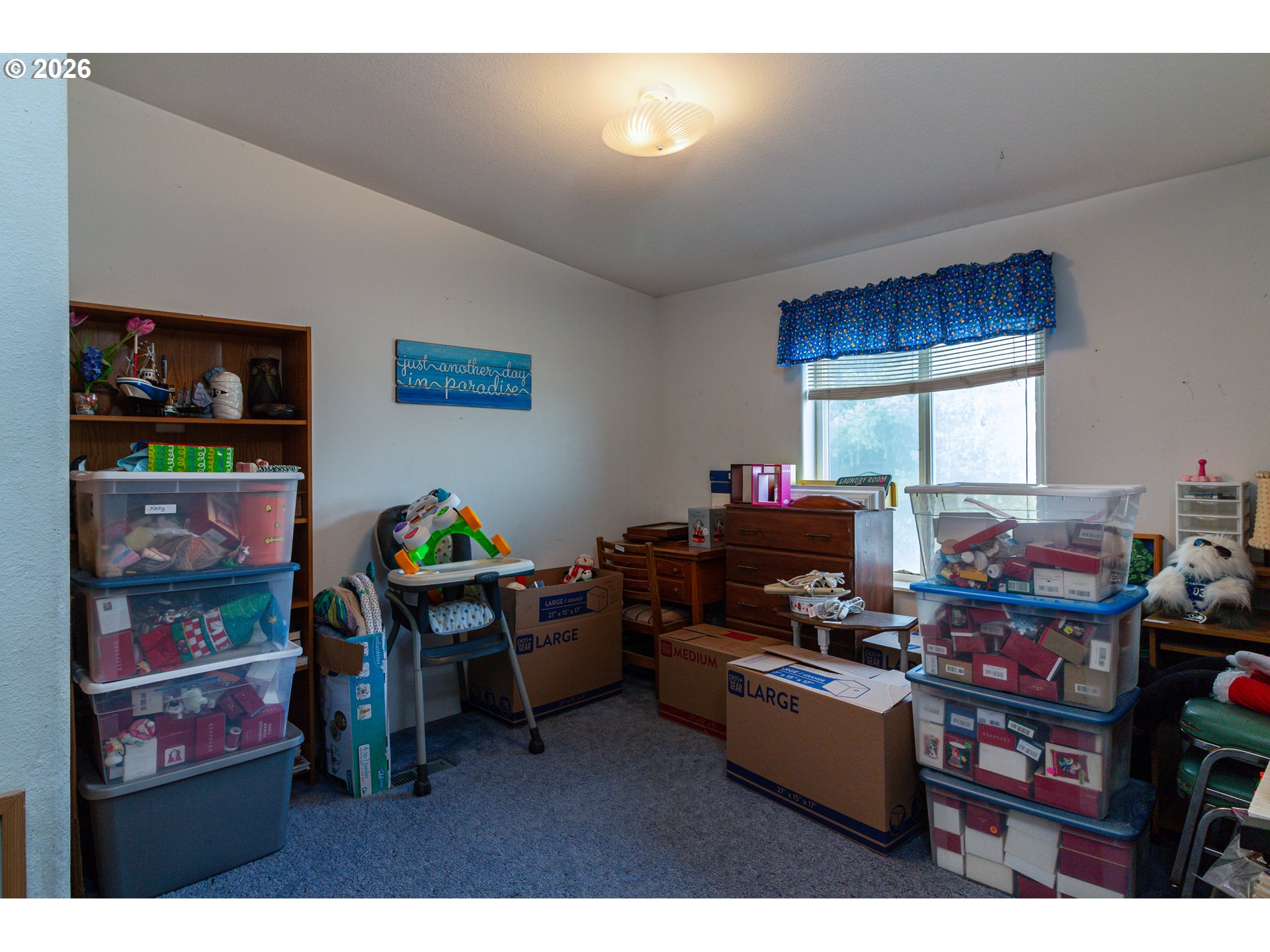 1375 Southwest 15th Street Hermiston, OR 97838 - Photo 13 of 14 a living room with furniture and a flat screen tv