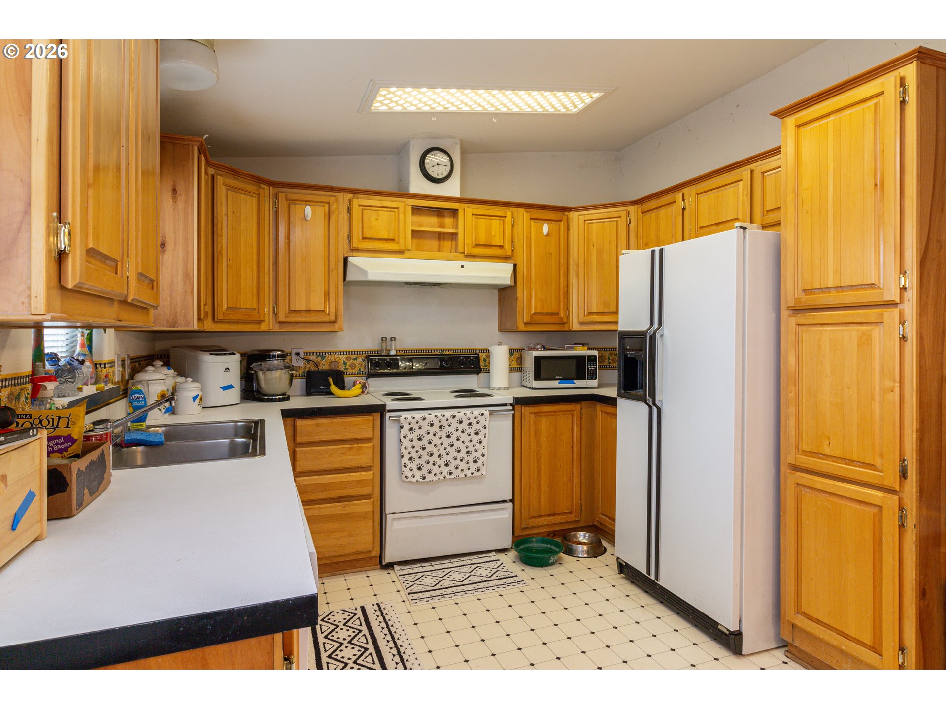 1375 Southwest 15th Street Hermiston, OR 97838 - Photo 8 of 14 a kitchen with stainless steel appliances granite countertop a refrigerator a stove and a sink