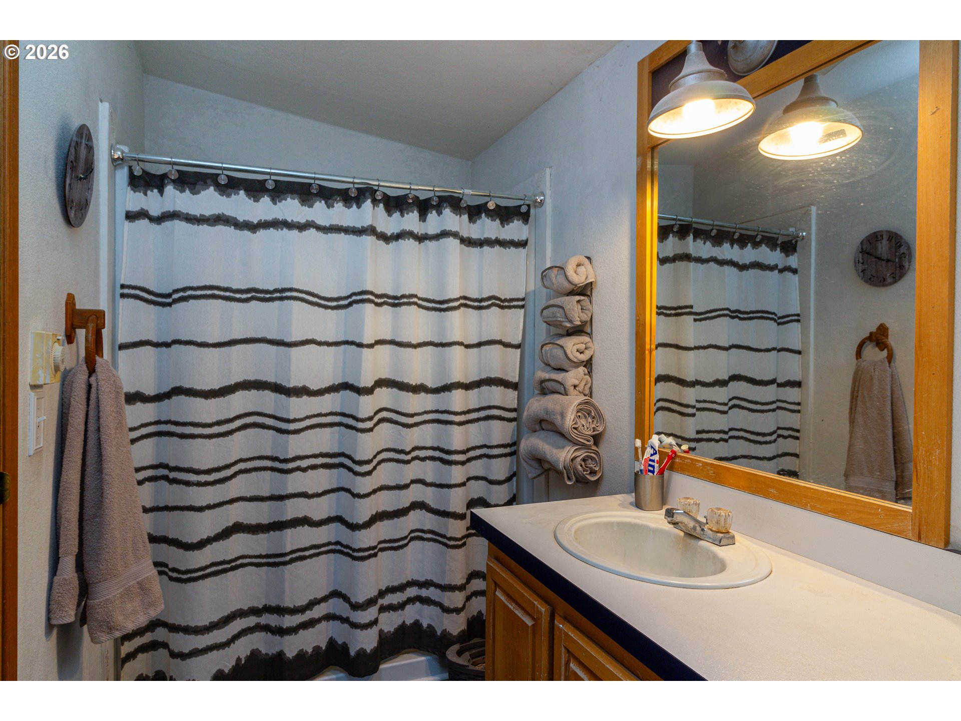 1375 Southwest 15th Street Hermiston, OR 97838 - Photo 10 of 14 a bathroom with a sink and a mirror