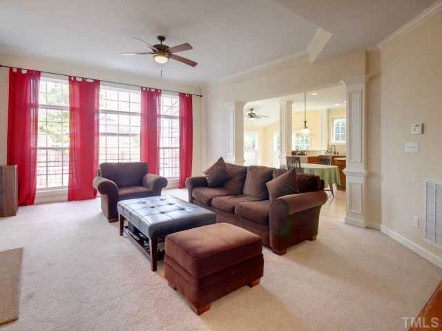 2412 Treen Street Raleigh, NC 27614 - Photo 11 of 25 Another view of the family room showing how it opens up to the kitchen