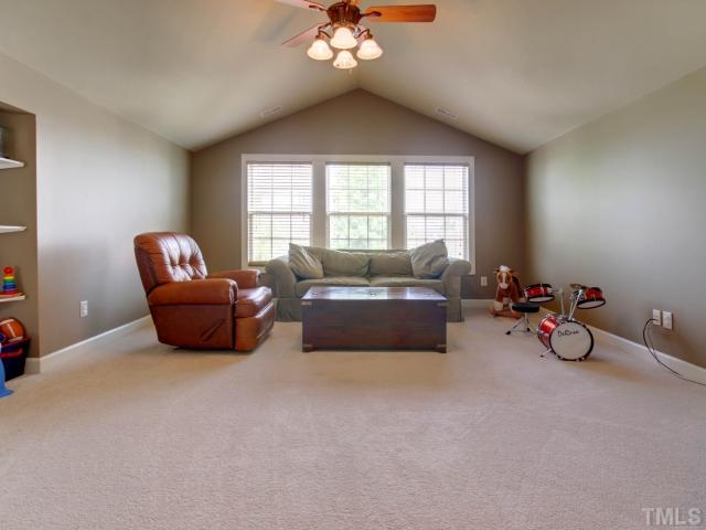 2412 Treen Street Raleigh, NC 27614 - Photo 20 of 25 Bonus room with built ins, peaked ceiling and more.
