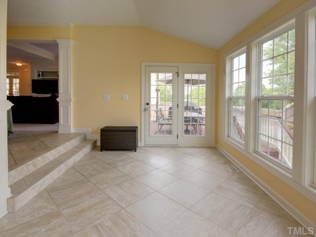 2412 Treen Street Raleigh, NC 27614 - Photo 9 of 25 Another view of the sunroom showing access to the deck
