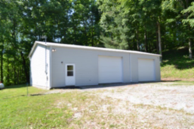 318 Rock Springs Road Celina, TN 38551 - Photo 1 of 87 a view of a backyard