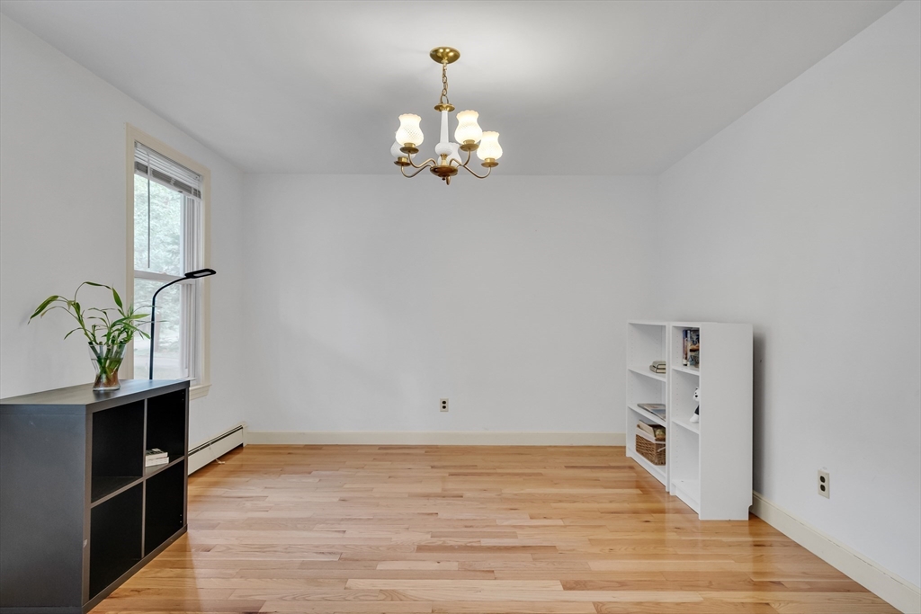 32 Dewey Road Lexington, MA 02420 - Photo 6 of 32 a view of an empty room with a window