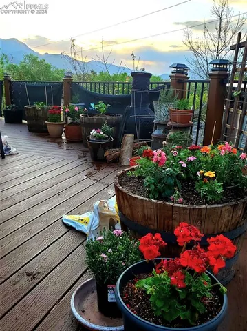 a view of a backyard with sitting area