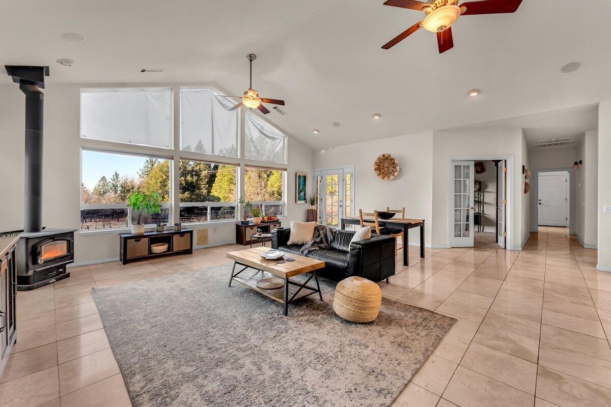 12757 Fern Road Whitmore, CA 96096 - Photo 11 of 62 a living room with furniture and a chandelier