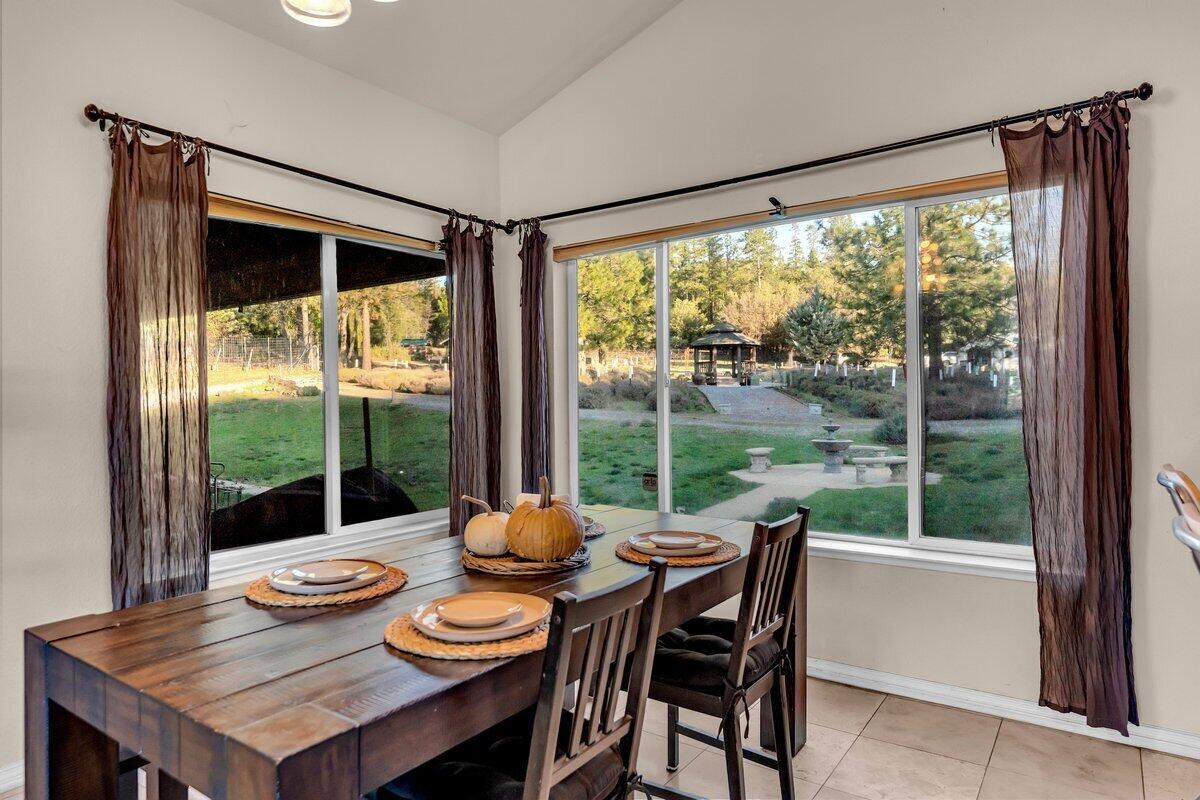12757 Fern Road Whitmore, CA 96096 - Photo 16 of 62 a view of a dining room with furniture window and outside view