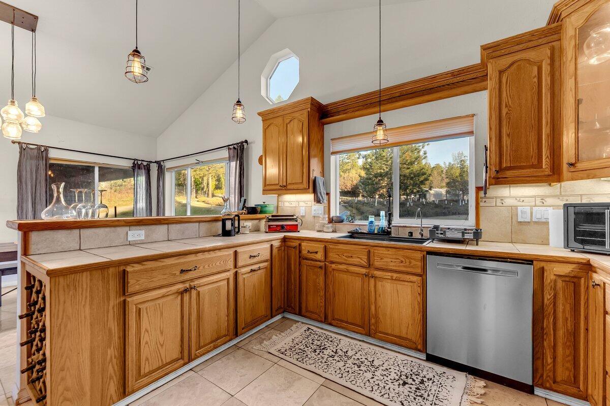 12757 Fern Road Whitmore, CA 96096 - Photo 18 of 62 a kitchen with a sink stove and cabinets
