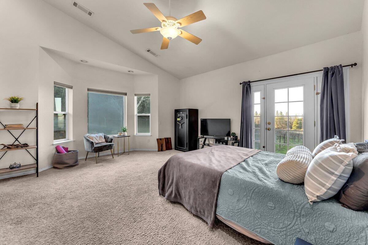 12757 Fern Road Whitmore, CA 96096 - Photo 20 of 62 a bedroom with bed and a large window