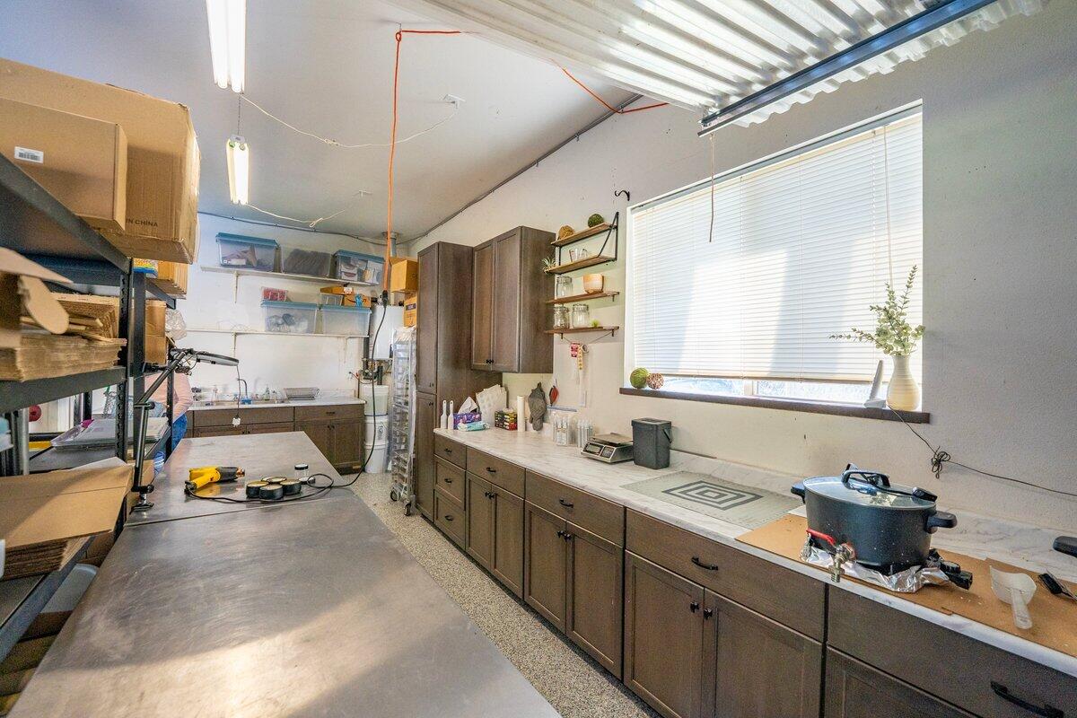12757 Fern Road Whitmore, CA 96096 - Photo 34 of 62 a bathroom with a double vanity sink and a mirror