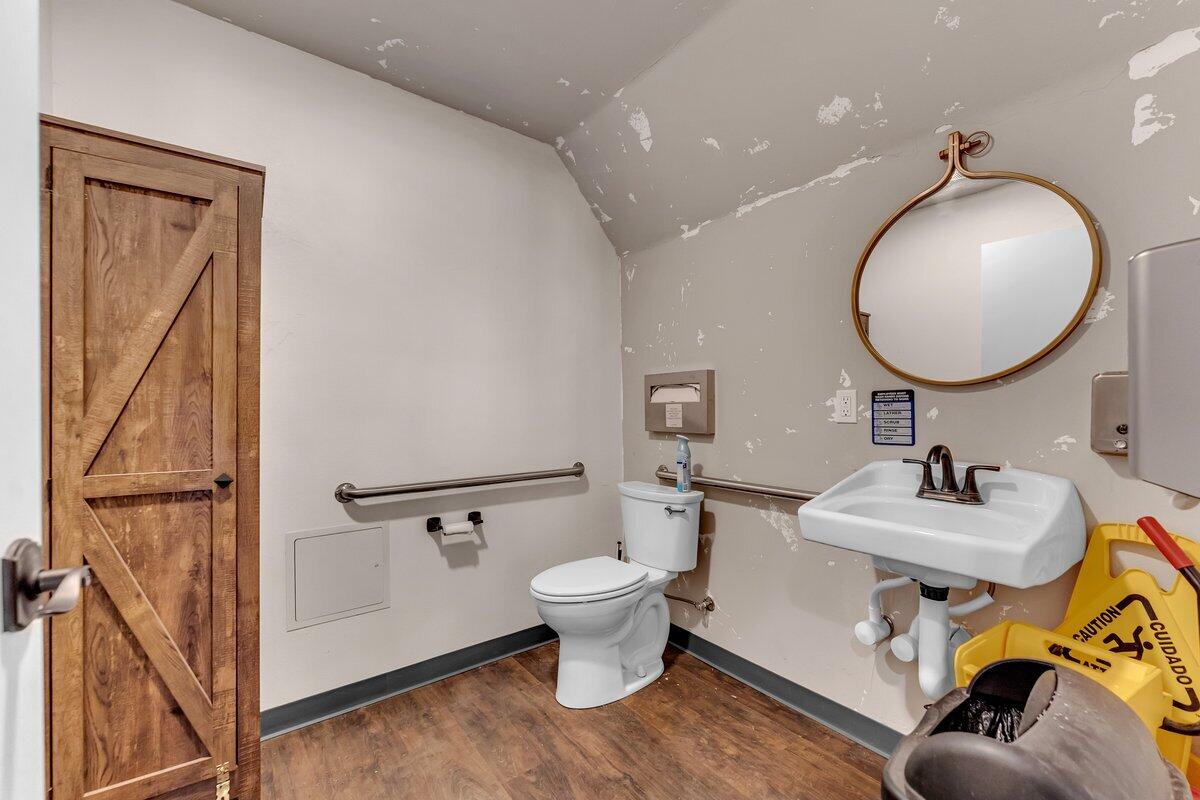 12757 Fern Road Whitmore, CA 96096 - Photo 43 of 62 a bathroom with a toilet sink and mirror