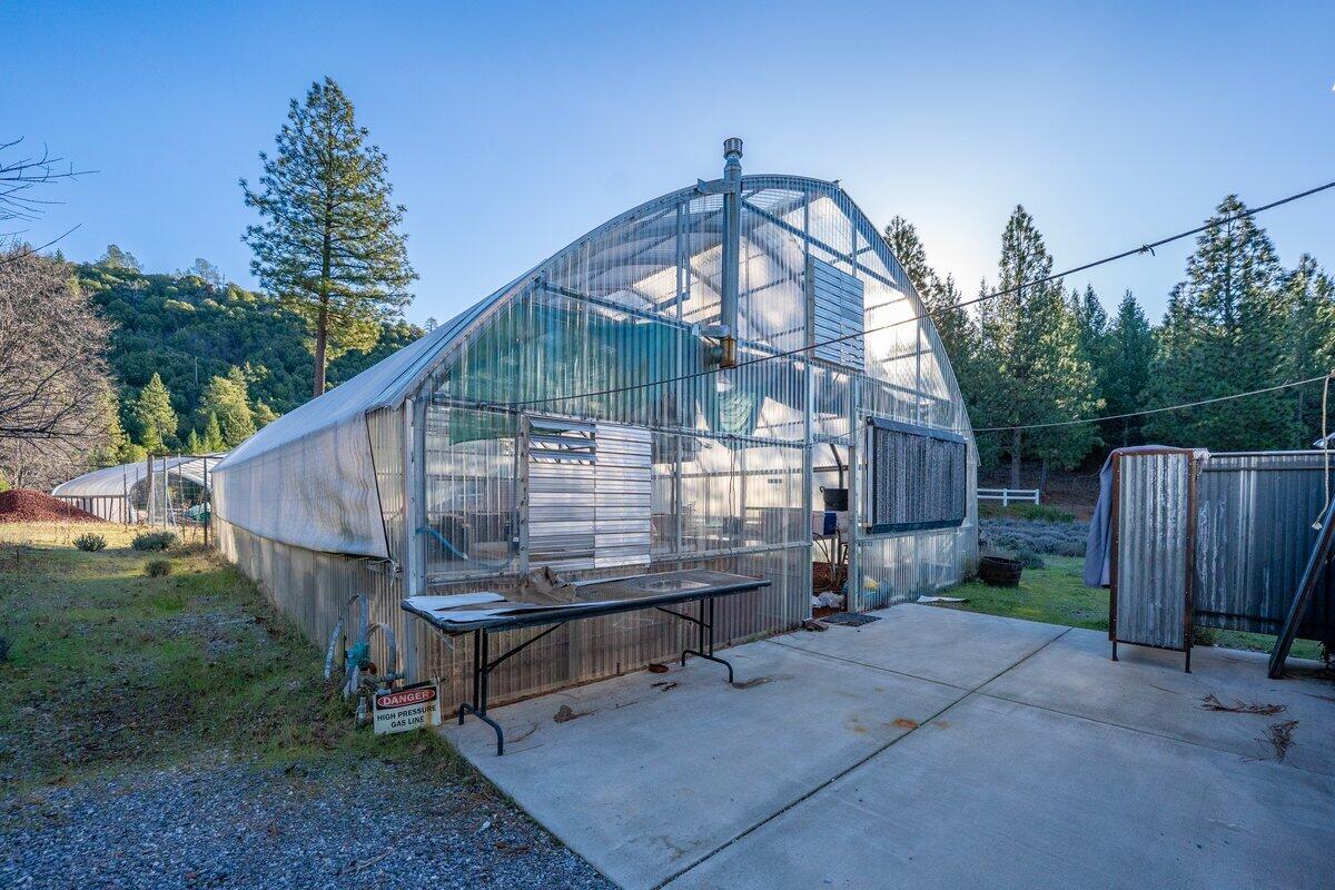 12757 Fern Road Whitmore, CA 96096 - Photo 44 of 62 a view of a wooden chairs in a backyard