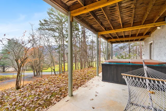 a bathroom with a sink toilet and mirror