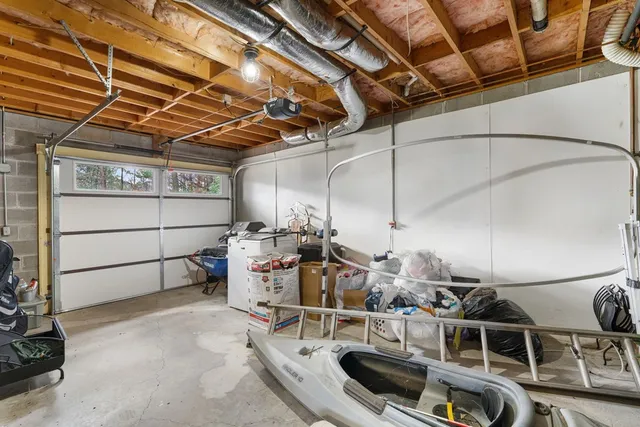 a bedroom with two beds and a couch