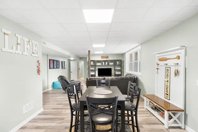 a bathroom with a sink toilet and a mirror