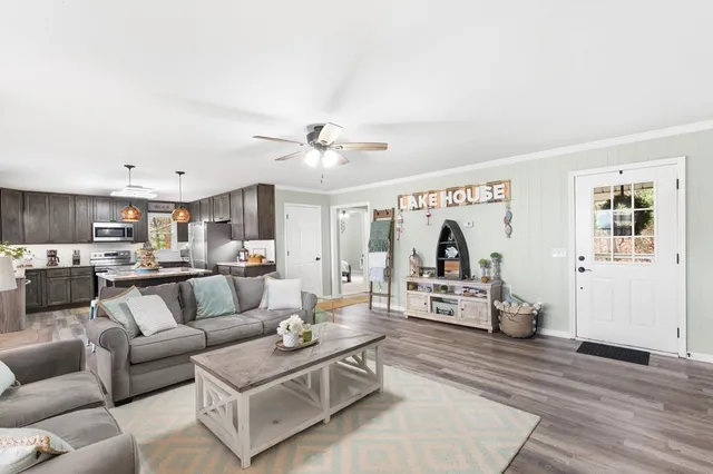 a view of a house with car parked