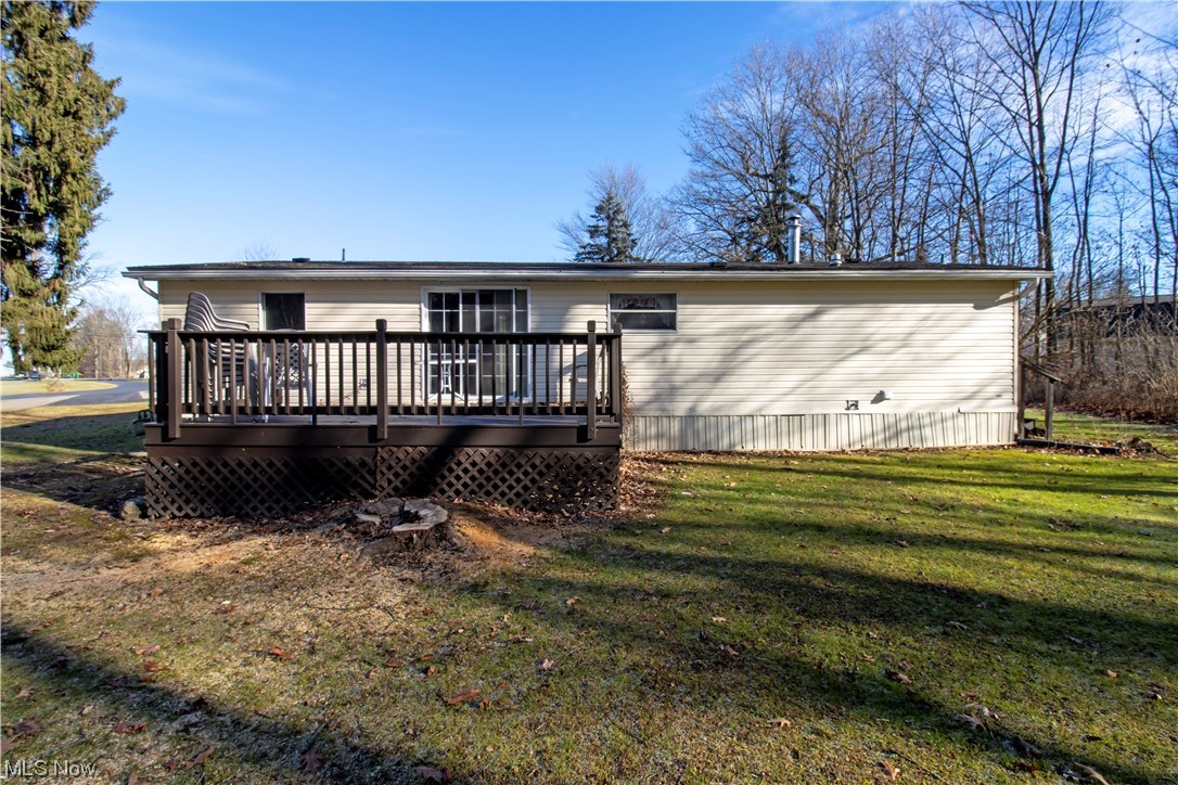 3233 Dover Road Wooster, OH 44691 - Photo 13 of 30 Back of property featuring a deck and a lawn