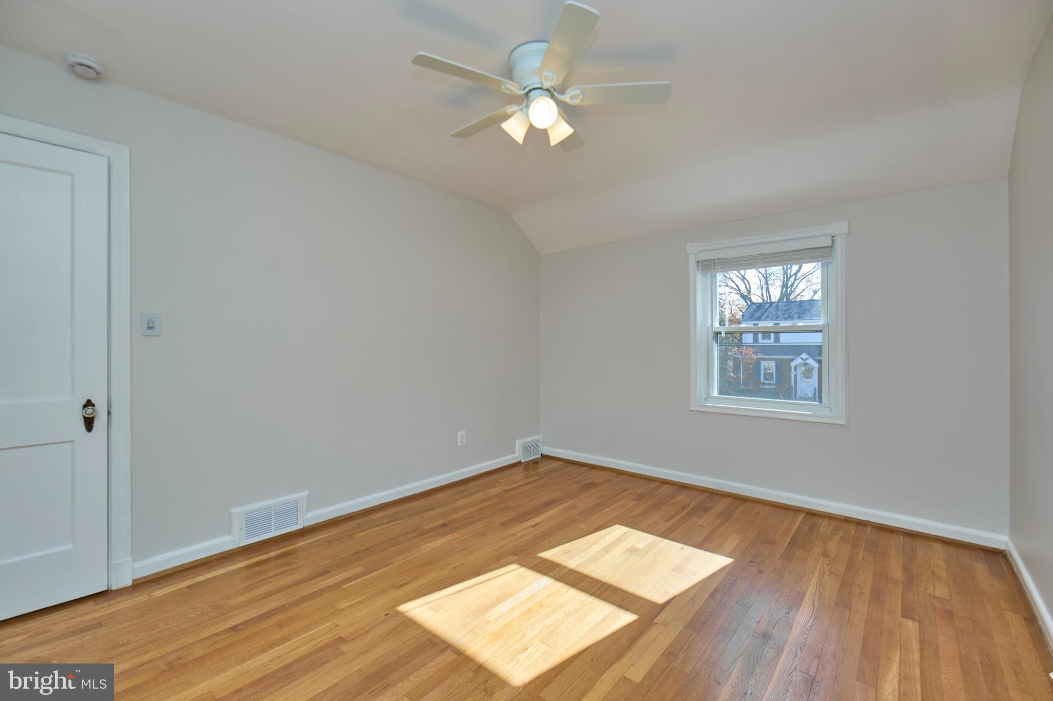 3727 2nd Street South Arlington, VA 22204 - Photo 15 of 30 wooden floor in an empty room with a window