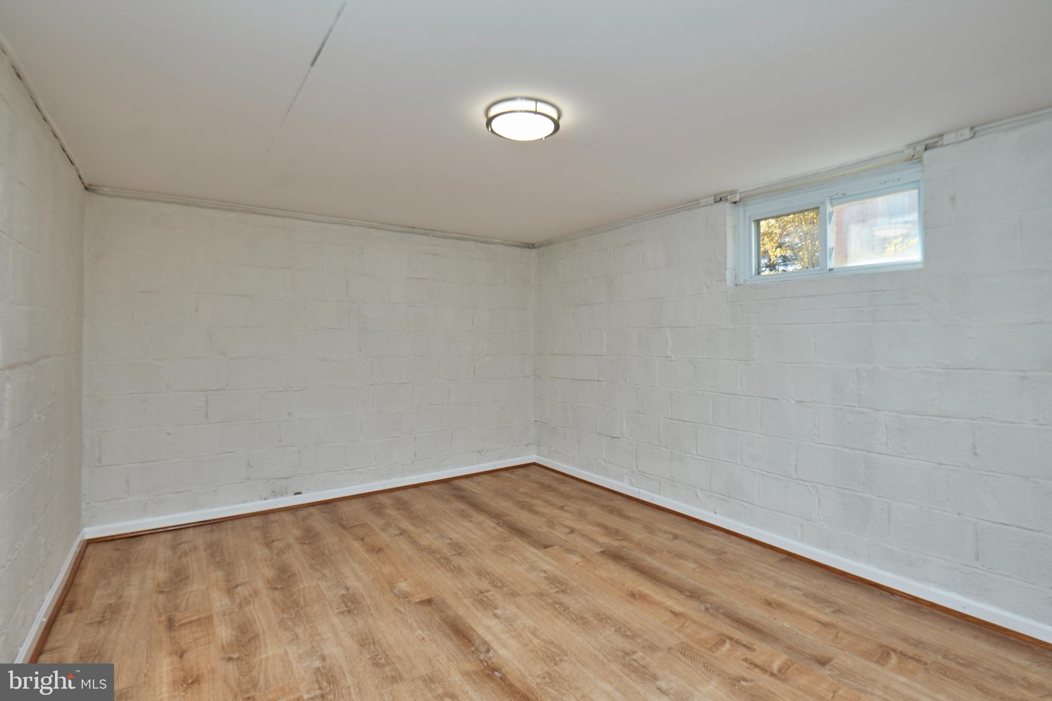 3727 2nd Street South Arlington, VA 22204 - Photo 22 of 30 a view of an empty room with a window