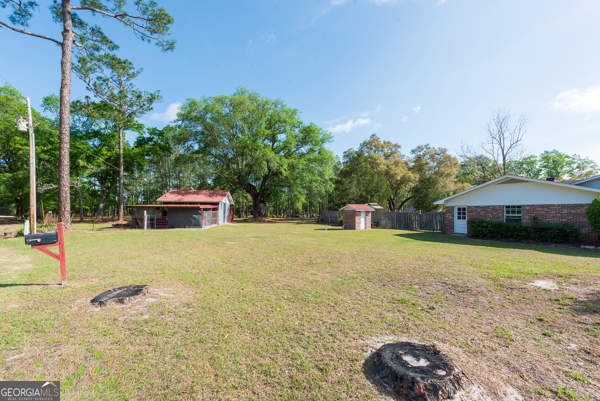 4582 St Johns Church Road Blackshear, GA 31516 - Photo 13 of 76 a front view of a house with a yard