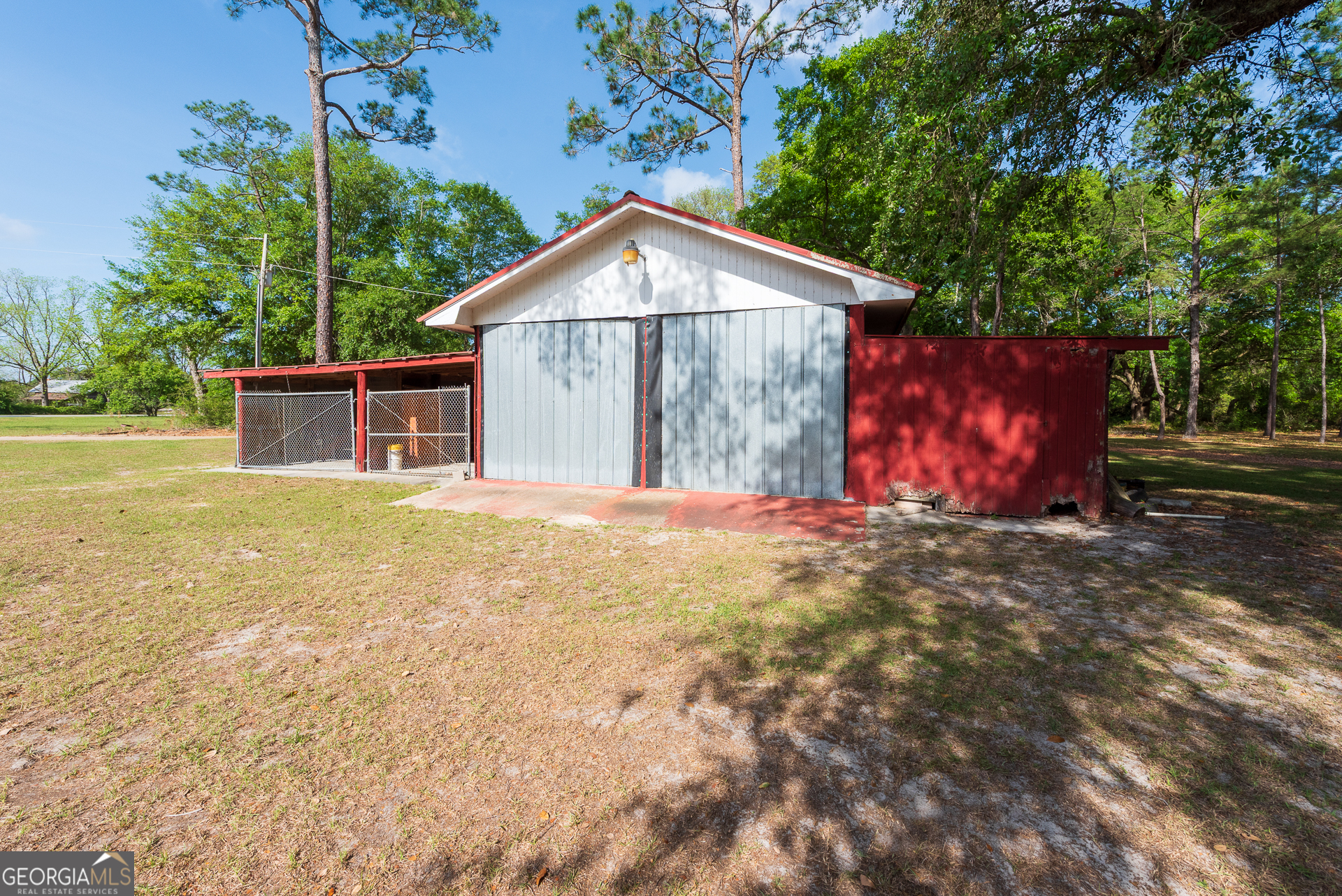4582 St Johns Church Road Blackshear, GA 31516 - Photo 16 of 76 a view of a house with backyard and tree