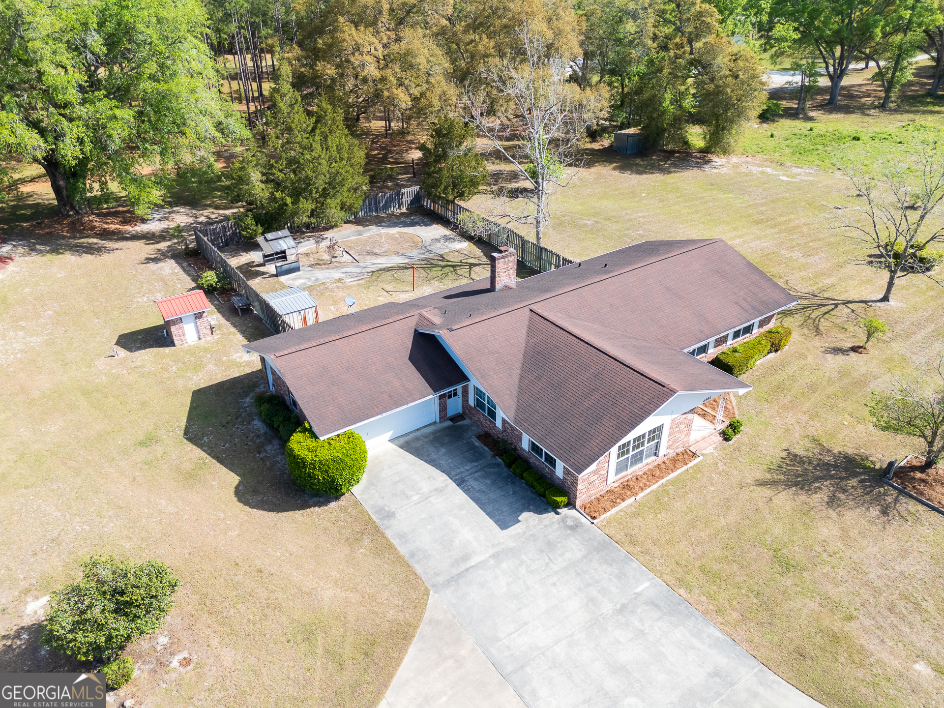 4582 St Johns Church Road Blackshear, GA 31516 - Photo 25 of 76 an aerial view of a house with yard and swimming pool