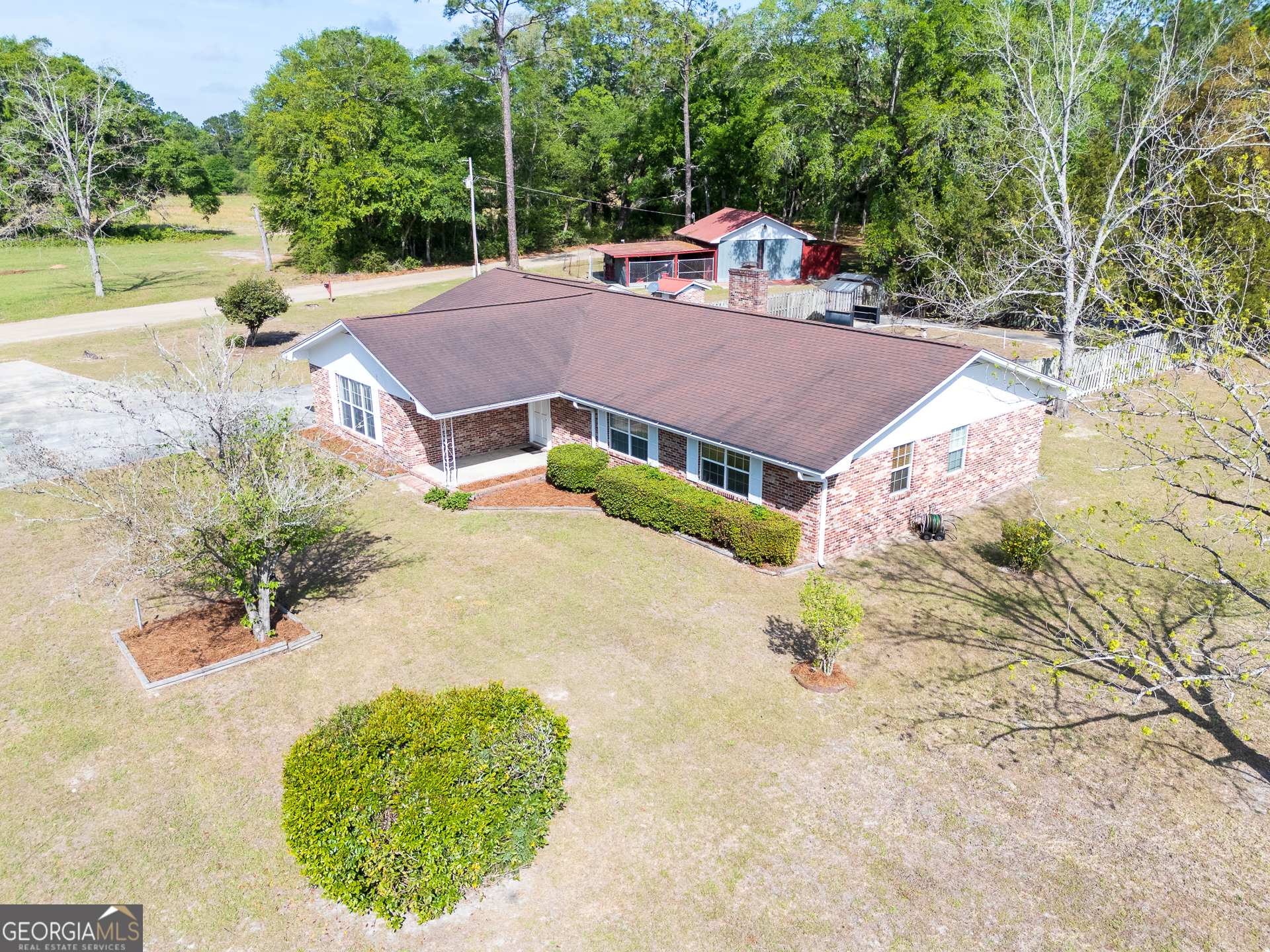 4582 St Johns Church Road Blackshear, GA 31516 - Photo 26 of 76 an aerial view of a house with yard swimming pool and outdoor seating