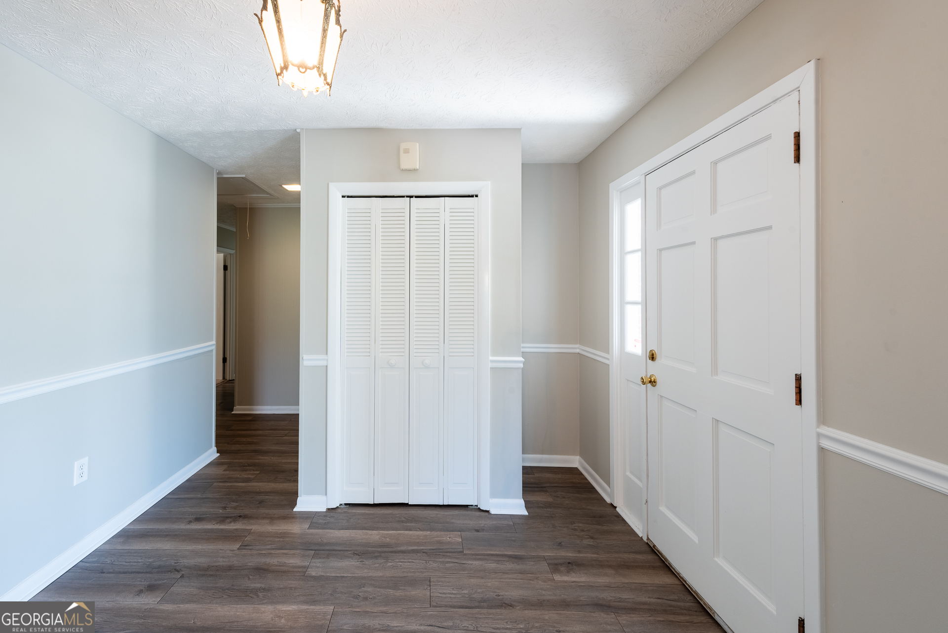 4582 St Johns Church Road Blackshear, GA 31516 - Photo 54 of 76 wooden floor in an empty room with a window