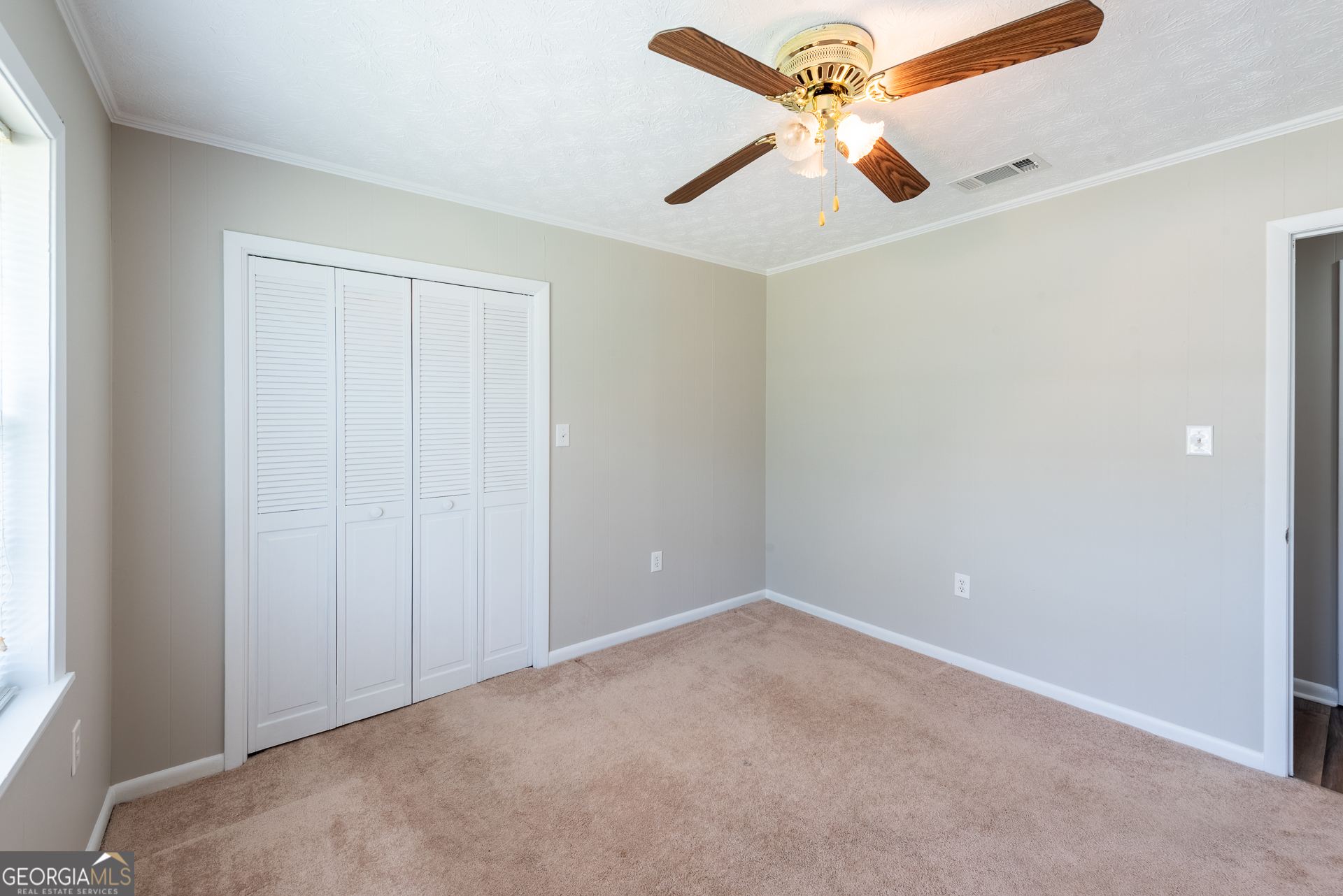 4582 St Johns Church Road Blackshear, GA 31516 - Photo 60 of 76 an empty room with chandelier fan