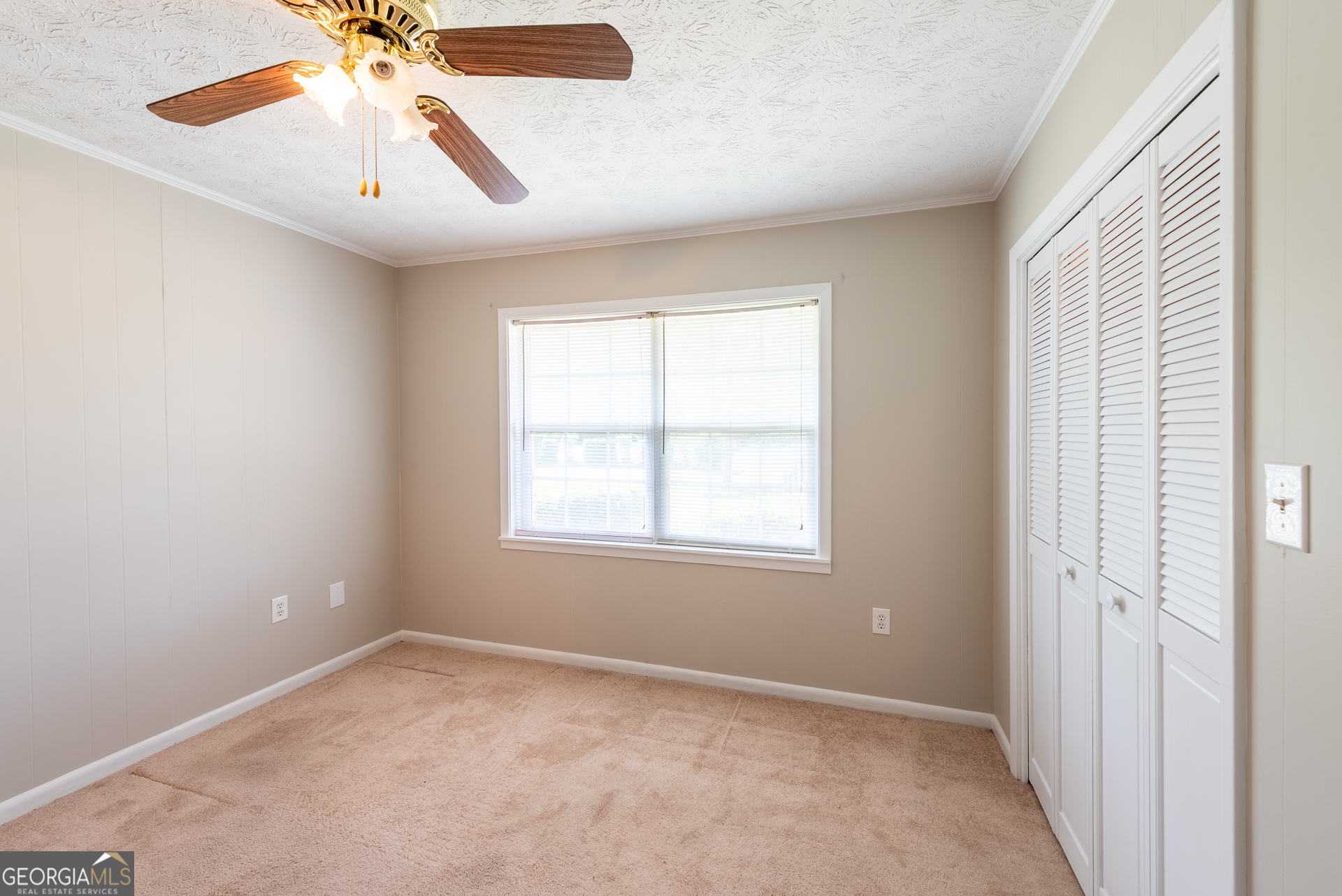 4582 St Johns Church Road Blackshear, GA 31516 - Photo 61 of 76 an empty room with a window and a fan