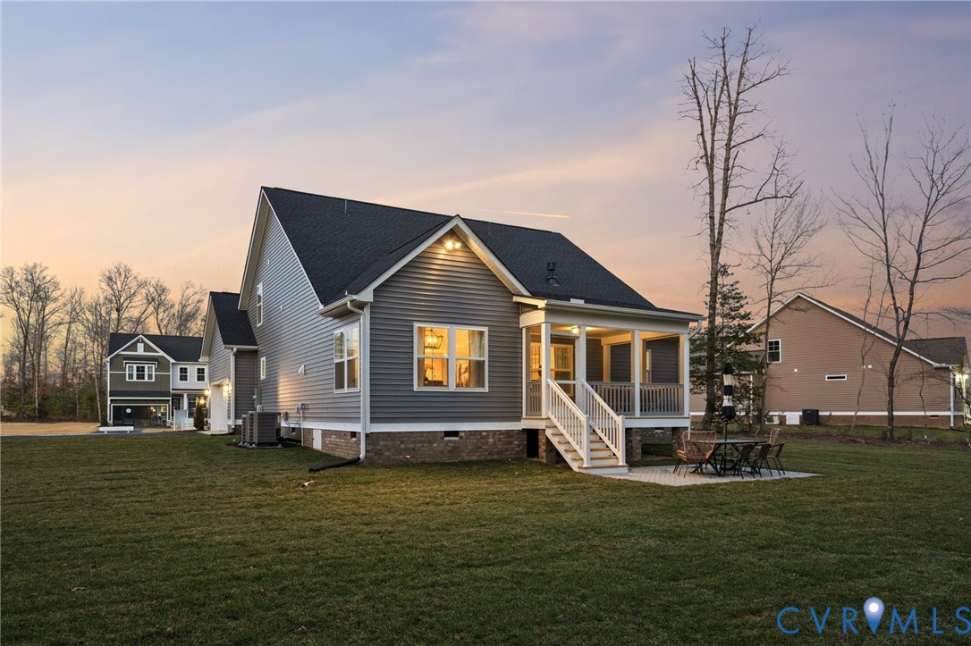 Tbd North Shore Road Locust Hill, VA 23092 - Photo 39 of 40 a front view of a house with a yard