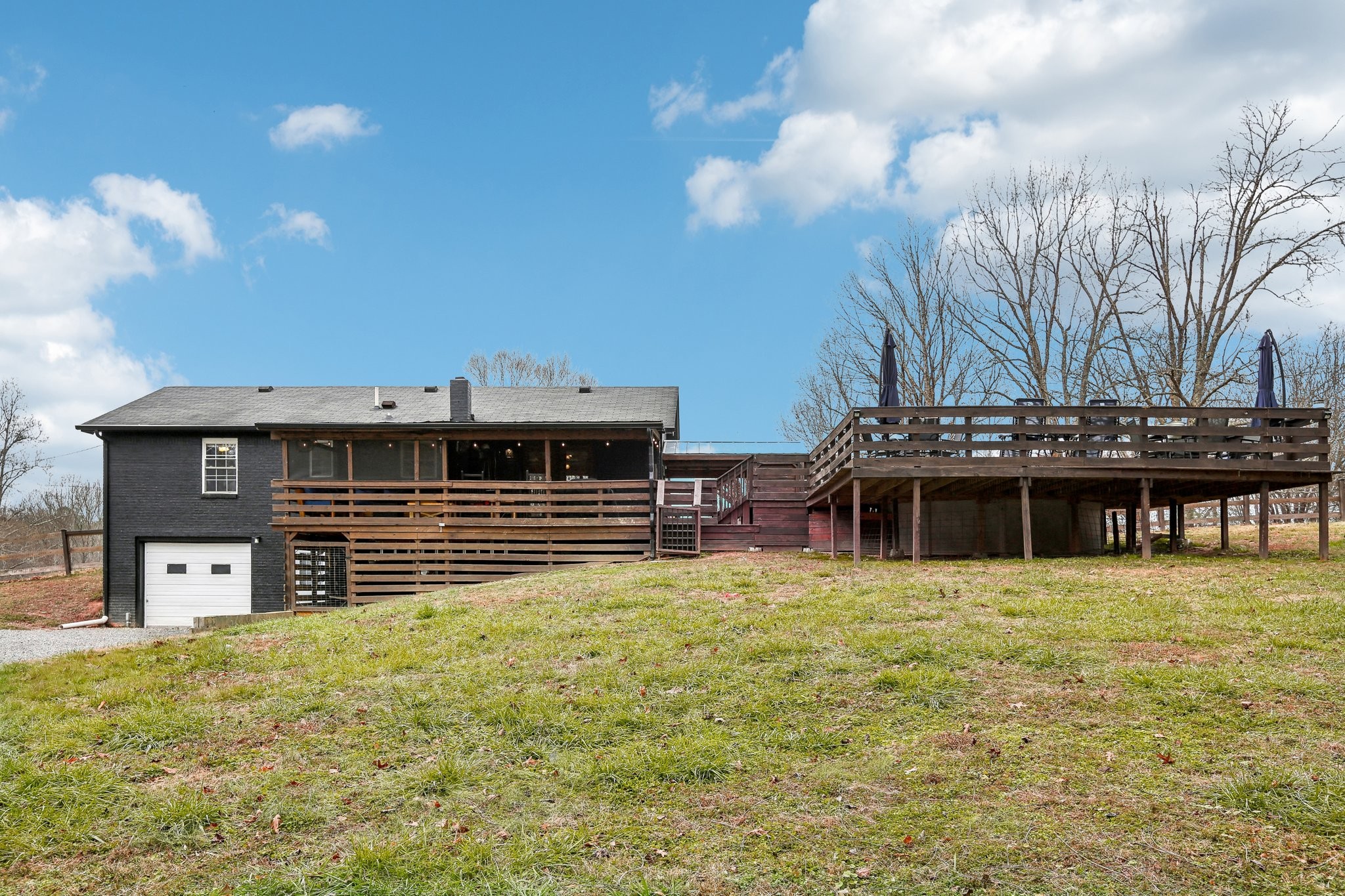 1776 Poss Road Smithville, TN 37166 - Photo 65 of 74 a house view with a swimming pool